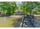Waterfront view featuring a wooden dock and picturesque scenery, perfect for relaxation and outdoor enjoyment at 639 Panther Point Trl, Richfield, NC 28137