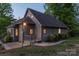 Charming home with a well-maintained lawn, mature trees, and inviting porch, offering great curb appeal at 639 Panther Point Trl, Richfield, NC 28137