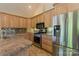 Well-appointed kitchen featuring stainless steel appliances, granite countertops, and ample cabinetry at 639 Panther Point Trl, Richfield, NC 28137