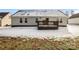 A backyard with a deck and snow-covered grass at 676 Rebecca Jane Dr, Mooresville, NC 28115