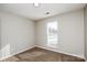 A bright bedroom featuring plush carpeting and a window with natural light at 676 Rebecca Jane Dr, Mooresville, NC 28115