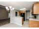 Well-designed kitchen offering breakfast bar seating and seamless flow into the dining area at 676 Rebecca Jane Dr, Mooresville, NC 28115