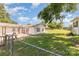 Spacious backyard featuring a patio and green lawn, ideal for outdoor enjoyment and relaxation at 7430 Forney Hill Rd, Denver, NC 28037
