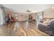Spacious living room with hardwood flooring and a view of the outside at 7430 Forney Hill Rd, Denver, NC 28037