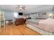 A large main bedroom has a sitting area and views to the outside at 7430 Forney Hill Rd, Denver, NC 28037