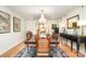Traditional dining room featuring a wood table, chandelier, and classic decor at 935 Trentle Ct, Charlotte, NC 28211