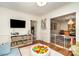 Spacious playroom with built-in storage, colorful play area, and easy access to kitchen at 935 Trentle Ct, Charlotte, NC 28211