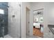 Modern bathroom showcases stylish tile shower and seamless glass door, creating a spa-like feel at 1008 Vanizer St, Charlotte, NC 28208