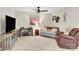 Bonus room featuring a ceiling fan, desk, loveseat, and chair at 103 Blackstone Ct # C, Statesville, NC 28677
