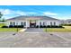 Clubhouse entrance with accessible parking and well-maintained landscaping, enhancing community aesthetics and accessibility at 103 Blackstone Ct # C, Statesville, NC 28677