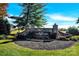Stone entrance sign for The Soo Club, set amongst lush landscaping and mature trees for a welcoming arrival at 103 Blackstone Ct # C, Statesville, NC 28677
