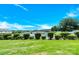 Scenic view of the community pool with lush green surroundings and clear blue sky, great for recreation at 103 Blackstone Ct # C, Statesville, NC 28677