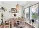 Well-lit dining area with a wooden table, comfortable seating, and stylish decor at 103 Blackstone Ct # C, Statesville, NC 28677