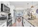Well-equipped kitchen with stainless steel appliances, granite countertops, and ample cabinet space at 103 Blackstone Ct # C, Statesville, NC 28677