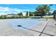 Blue tennis courts surrounded by trees under clear sky, great for recreational activities at 103 Blackstone Ct # C, Statesville, NC 28677