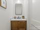 Stylish bathroom features a modern vanity, sleek mirror, and neutral tones, creating a serene space at 113 Prince St, Belmont, NC 28012