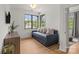 Comfortable room featuring natural light, a trundle daybed, and stylish decor at 113 Prince St, Belmont, NC 28012
