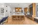 Spacious kitchen with large island, wooden cabinets and pendant lighting creating a warm, inviting atmosphere at 113 Prince St, Belmont, NC 28012