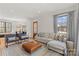 Bright living room with an open layout that features modern decor and plenty of natural light at 113 Prince St, Belmont, NC 28012