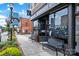 Honeycomb Cafe exterior with sleek glass storefront, street bench, and inviting sidewalk appeal at 113 Prince St, Belmont, NC 28012