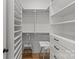 An organized, walk-in closet with shelves and drawers providing plenty of storage space at 113 Prince St, Belmont, NC 28012