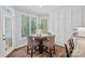 Cozy breakfast nook with a table, seating, and natural light streaming through the window at 116 Ivy Hollow Ln, Mooresville, NC 28117