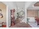 Foyer with hardwood floors, showcasing the staircase and views into the living room and dining spaces at 116 Ivy Hollow Ln, Mooresville, NC 28117