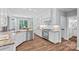 Bright kitchen with white cabinetry, stainless steel appliances, and granite countertops, blending style and functionality at 116 Ivy Hollow Ln, Mooresville, NC 28117