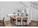 Open concept kitchen features an island with seating and stainless steel appliances at 116 Ivy Hollow Ln, Mooresville, NC 28117