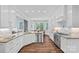 Bright, spacious kitchen features granite countertops, stainless appliances, and hardwood floors at 116 Ivy Hollow Ln, Mooresville, NC 28117