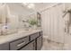 Stylish bathroom featuring a granite vanity, modern fixtures, and decorative accents at 1178 Arges River Dr, Fort Mill, SC 29715