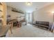 Spacious bonus room with carpet, ample natural light, and flexible layout; perfect for recreation or hobbies at 1178 Arges River Dr, Fort Mill, SC 29715