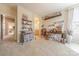 Bonus room with work area, shelving, and storage options, bathed in natural light at 1178 Arges River Dr, Fort Mill, SC 29715