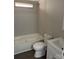 Compact bathroom featuring a bathtub, toilet, and vanity with modern fixtures at 121 C & K Dr # 60, Taylorsville, NC 28681
