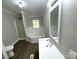 Bright bathroom featuring a tub, shower, and modern vanity with a large mirror at 121 C & K Dr # 60, Taylorsville, NC 28681