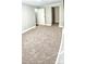 A bright and spacious bedroom with plush carpeting, a closet, and an open door at 121 C & K Dr # 60, Taylorsville, NC 28681