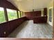 The screened porch has wood accents and plenty of room for outdoor lounging at 121 C & K Dr # 60, Taylorsville, NC 28681