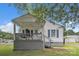 Charming home features a covered front porch with a swing and blue shutters at 123 E Farmview St, Gastonia, NC 28054
