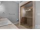 Modern bathroom features a glass shower and a double sink vanity at 1500 Pecan Ave, Charlotte, NC 28205