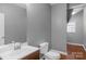 Bathroom featuring a toilet and sink at 1500 Pecan Ave, Charlotte, NC 28205