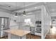 Modern kitchen with granite countertops, stainless steel appliances, and ample cabinet space at 1500 Pecan Ave, Charlotte, NC 28205