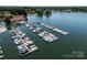 Expansive aerial view of the marina showcasing numerous boat slips and stunning waterfront access at 17931 Kings Point Dr # E, Cornelius, NC 28031