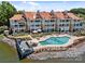 Aerial shot of condos with pool and waterfront access and boat dock at 17931 Kings Point Dr # E, Cornelius, NC 28031