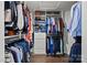 Walk-in closet with custom shelves, hanging rods, and drawers for optimal storage and organization at 17931 Kings Point Dr # E, Cornelius, NC 28031