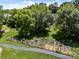 Aerial view of a well-maintained community garden with multiple raised beds at 17931 Kings Point Dr # E, Cornelius, NC 28031