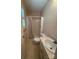 Functional bathroom with a shower-tub combination, vanity, and neutral finishes at 200 Breslin St, Wadesboro, NC 28170