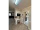 Cozy home office nook with built-in desk and overhead cabinets, perfect for remote work or study at 200 Breslin St, Wadesboro, NC 28170