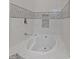 Modern bathtub with tile surround and inset storage at 2117 Middlebridge Ct, Fort Mill, SC 29715