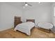 Bright bedroom with hardwood floors, neutral walls, ceiling fan and furniture at 2117 Middlebridge Ct, Fort Mill, SC 29715