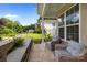 Relaxing front porch with two wicker chairs, perfect for enjoying the neighborhood views at 2117 Middlebridge Ct, Fort Mill, SC 29715